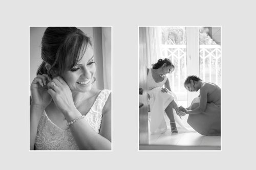 Bride getting ready, assisted by her best friend to put on wedding shoes.